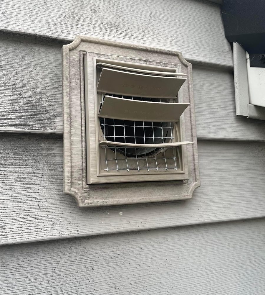 Screened vent cover installed to keep wildlife out of a home